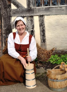 Dairy maid Anna Fielding makes butter in Tudor style at Little Moreton Hall C Alan Ingram/National Trus
