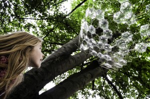 Grace Cookson checks out the canapy by Hannah Imlach in Sparrow Park ⓒ FIona Bailey