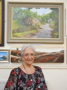 Jean Byatt and her oil painting ‘A Shady Lane’